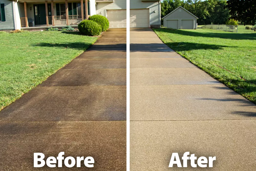 Driveway before and after power washing — left half shows the stained, dirty surface; right half shows it clean.