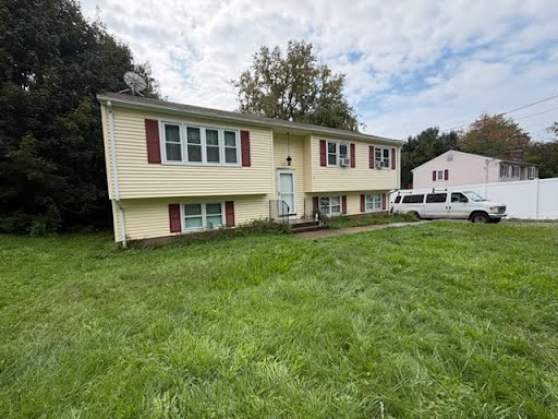 House siding before and after a Double S soft wash — green algae removed, siding left undamaged.