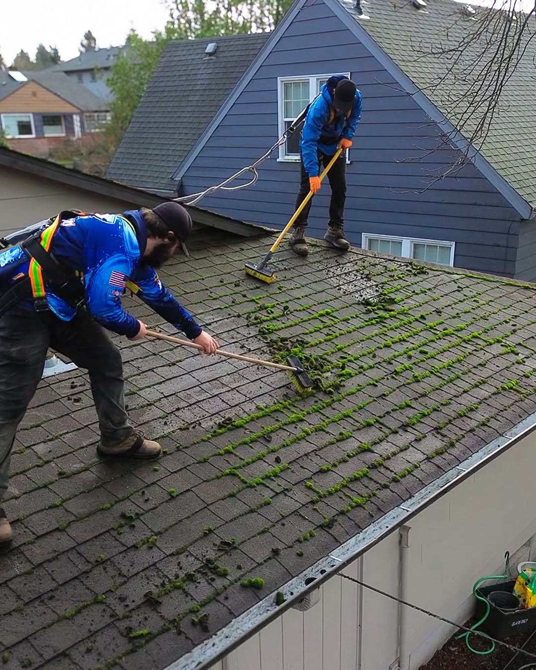 A Double S Power Washing roof cleaning setup on site.