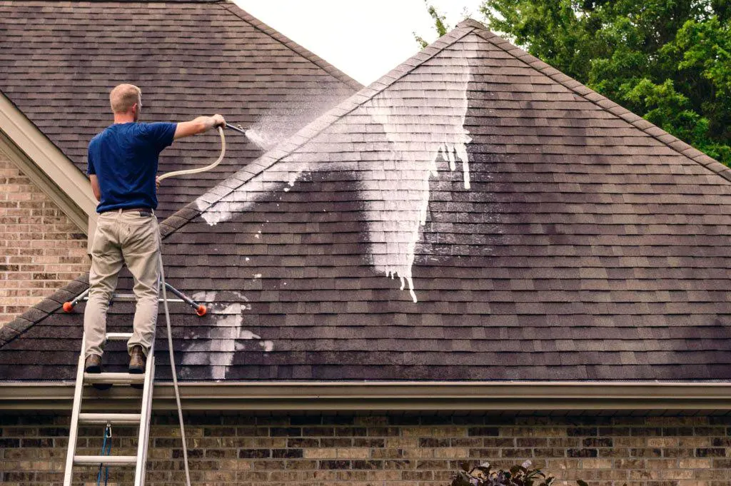 A clean, well-maintained asphalt-shingle roof on a home — the result of a professional soft wash.